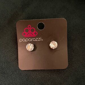 Post earring. White gemstone/silver setting.